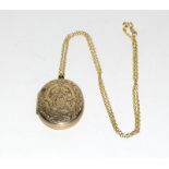 9ct Gold oval locket on a fine 9ct Gold chain.