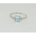 A Natural Aquamarine and Diamond 18ct white gold ring size N 1/2.