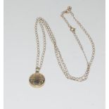 9ct Gold locket with a 9ct Gold chain.