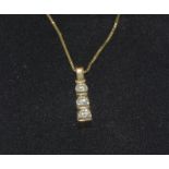 Diamond 3 stone drop pendant 0.25 ct on 9ct Gold chain.