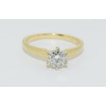 18ct yellow gold diamond solitaire ring - 0.75 points, Size O.
