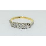 A Vintage five stone Diamond ring in 18ct gold and platinum, size P.