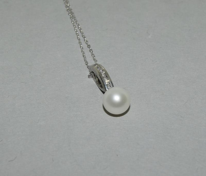 A diamond and pearl drop pendant necklace. - Image 2 of 3