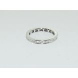 An 18ct white gold Princess cut Diamond 1.5ct full Diamond eternity band ring Size P 1/2.