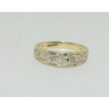 A Vintage 9ct gold and diamond celtic mans rings, size s1/2, 3.7 grams.