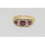 An antique 18ct yellow gold Ruby and Diamond ring, Size K.