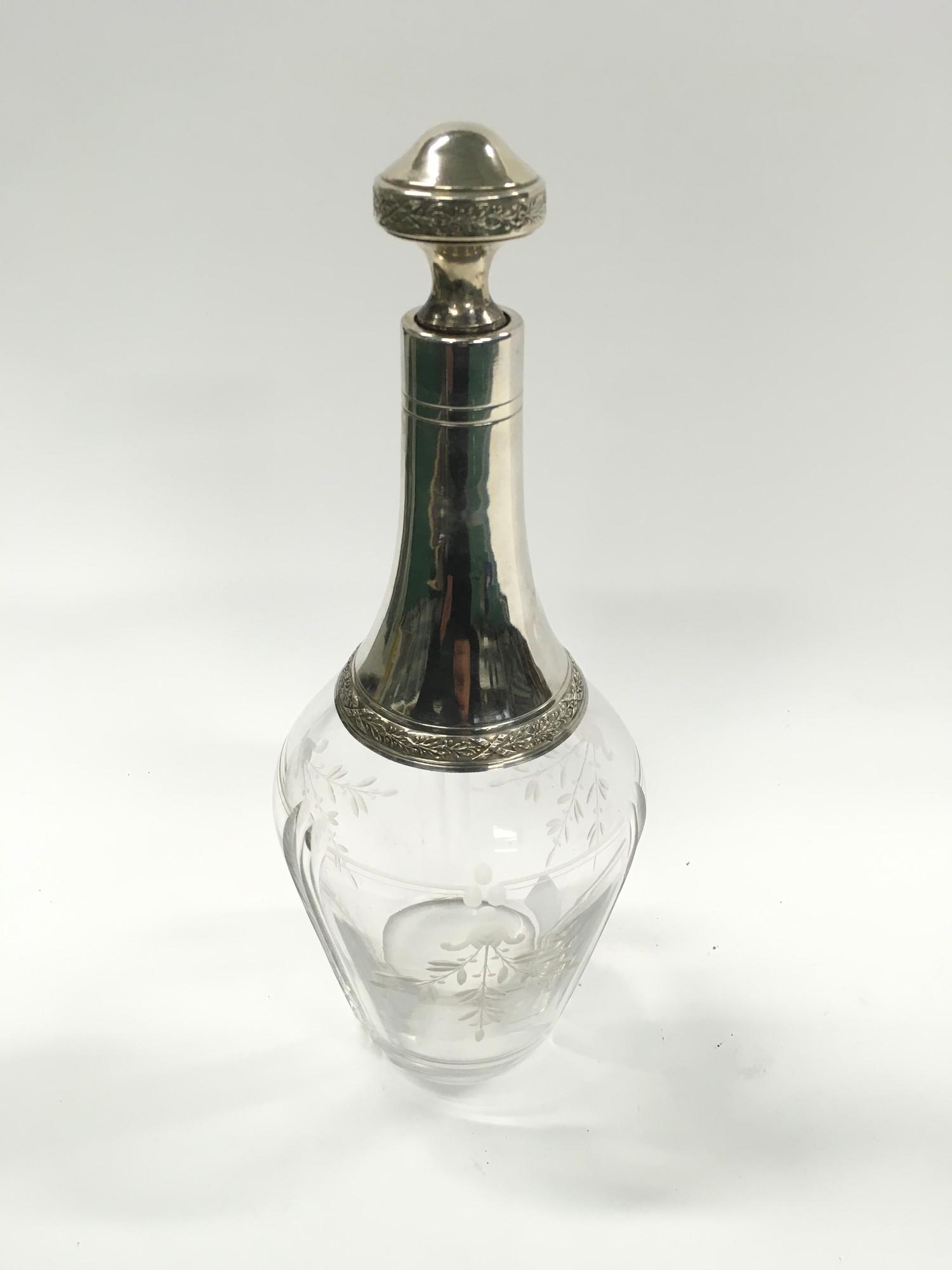 French Silver Mounted Decanter with Floral Enamel Decoration.