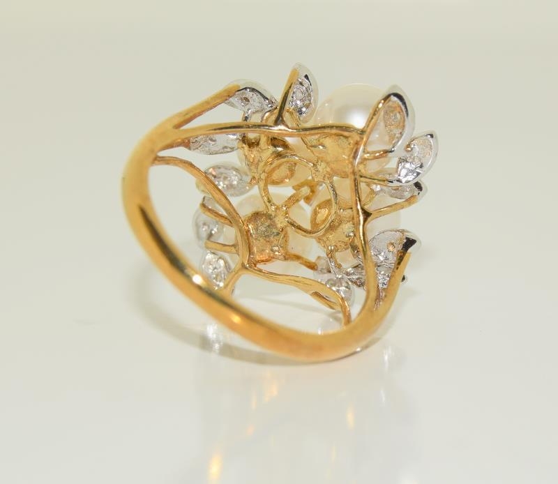 A 9ct gold ladies diamond and pearly cluster ring, Size N. - Image 3 of 3