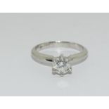 A Platinum set single stone ring of 65 points approx. Size L