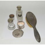 Silver dressing table brush, Silver compact, Silver napkin ring and misc items.
