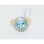Ilana 18ct Gold Blue Topaz and Baguette Diamond ring. Size O+.