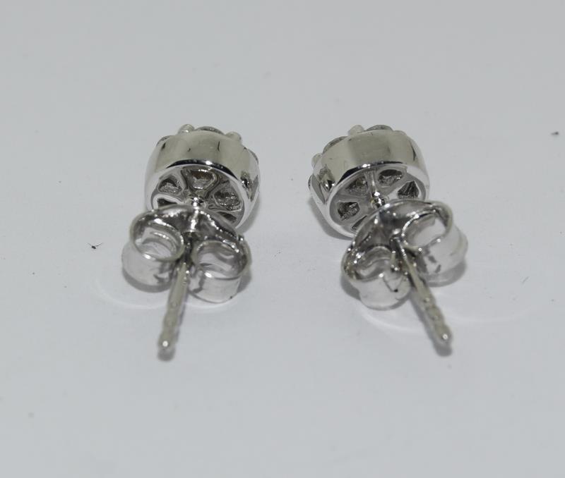 A pair of 18ct white gold stud earrings of 50 points. - Image 3 of 3