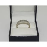 18ct White Gold (tested) Diamond eternity ring. Size T, Boxed.