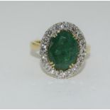 18ct gold Emerald and Diamond ring. Emerald approx 3.6ct and Diamond approx 1ct.