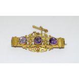 A late Victorian/Edwardian three stone Amethyst and Pearl Brooch.