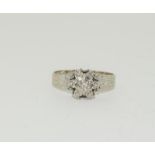 A Vintage 18ct white gold and diamond cluster ring, Size M, 2.7 grams.