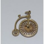 9Ct Gold Articulated Penny-farthing Charm. 20mm. 2.7g