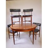 A 1960s G-Plan Fresco teak extending dining table and chairs, designed by Victor B. Wilkins, 48"