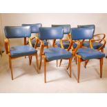 A set of six retro mid C20th beech and vinyl elbow chairs by Thurston & Co. Ltd, 31" high