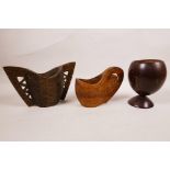 A Norwegian carved wood kuksa cup, together with a similar Norwegian kjenge two handled cup, and a