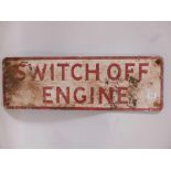 A vintage enamel garage sign, 'Switch Off Engine', with raised lettering, 29½" x 10"