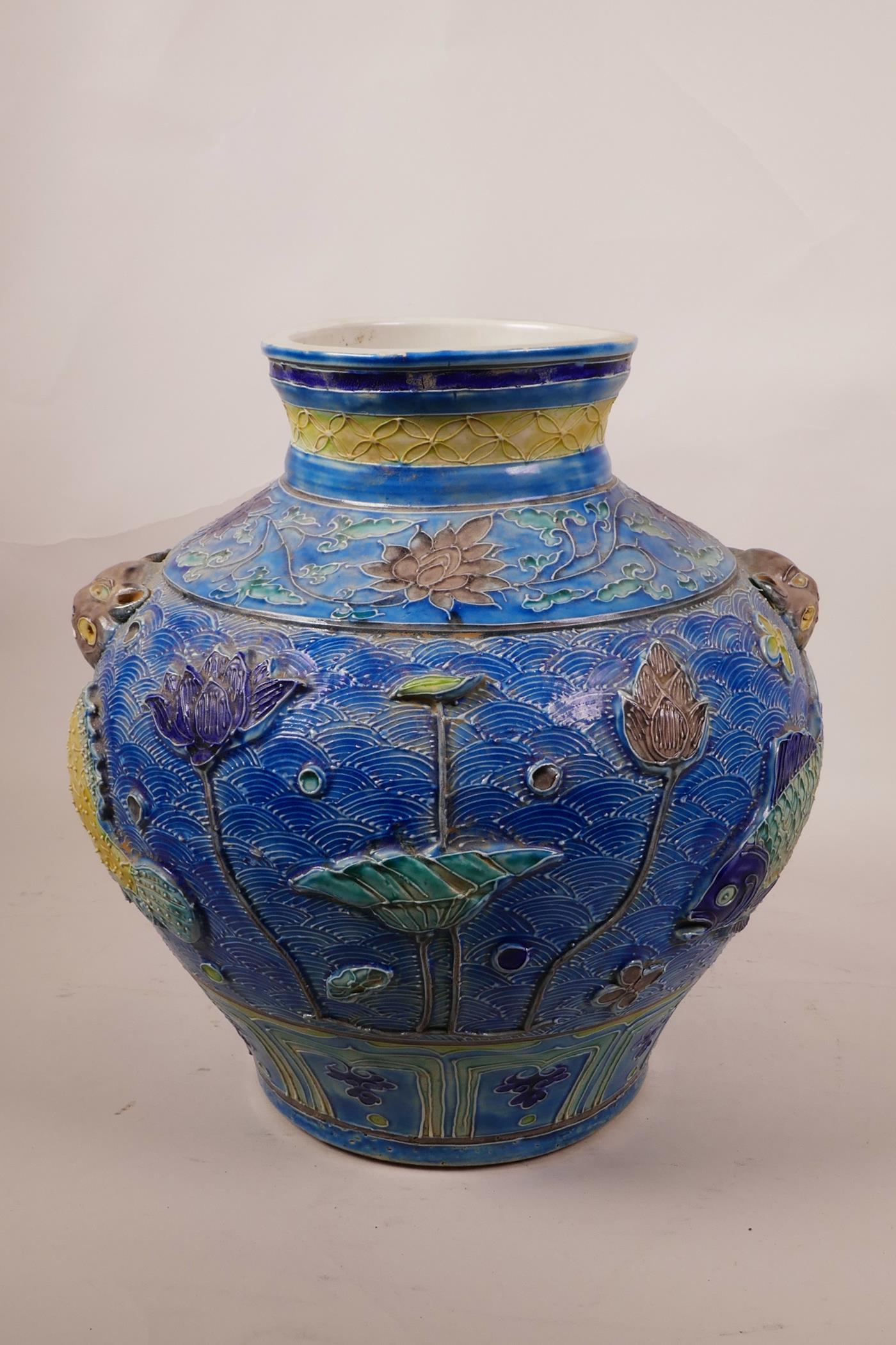 A large Chinese blue ground jar with two mask handles, the body with raised carp decoration, 8 - Image 4 of 7
