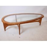 A 1960s teak 'Stateroom by Stonehill' coffee table, 24" x 52", 16" high