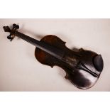 A copy of a Stradivarius violin with a two piece back, 23" long