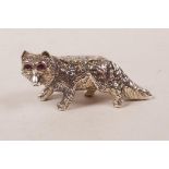 A sterling silver fox with ruby set eyes, 1½" long