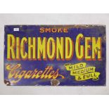 An early C20th enamelled advertising sign for Richmond Gem Cigarettes, 30" x 18"