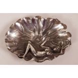 A Chinese white metal pin tray in the form of a leaf with raised decoration, 4 character mark to