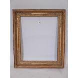 An early C19th French Empire style gilt composition picture frame, aperture size 26½" x 22"