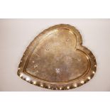A heart shaped silver plated tray raised on five stud feet, 13½" x 12"