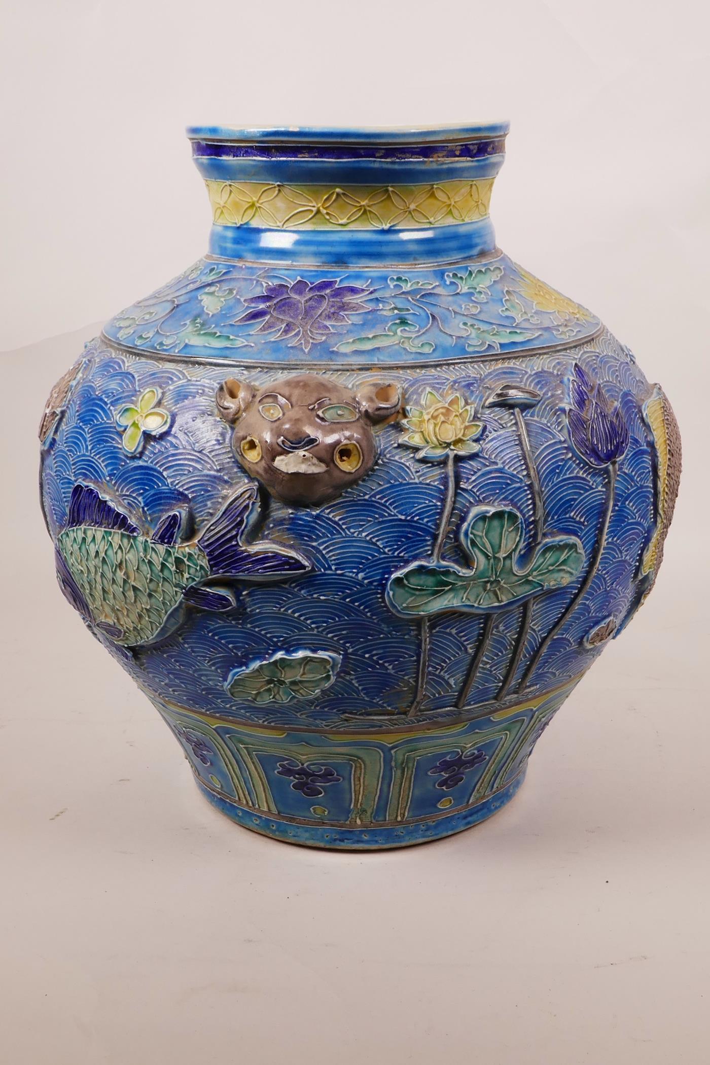 A large Chinese blue ground jar with two mask handles, the body with raised carp decoration, 8 - Image 5 of 7