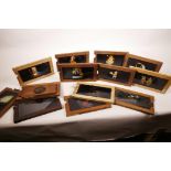 Fourteen mechanical magic lantern slides, various subjects