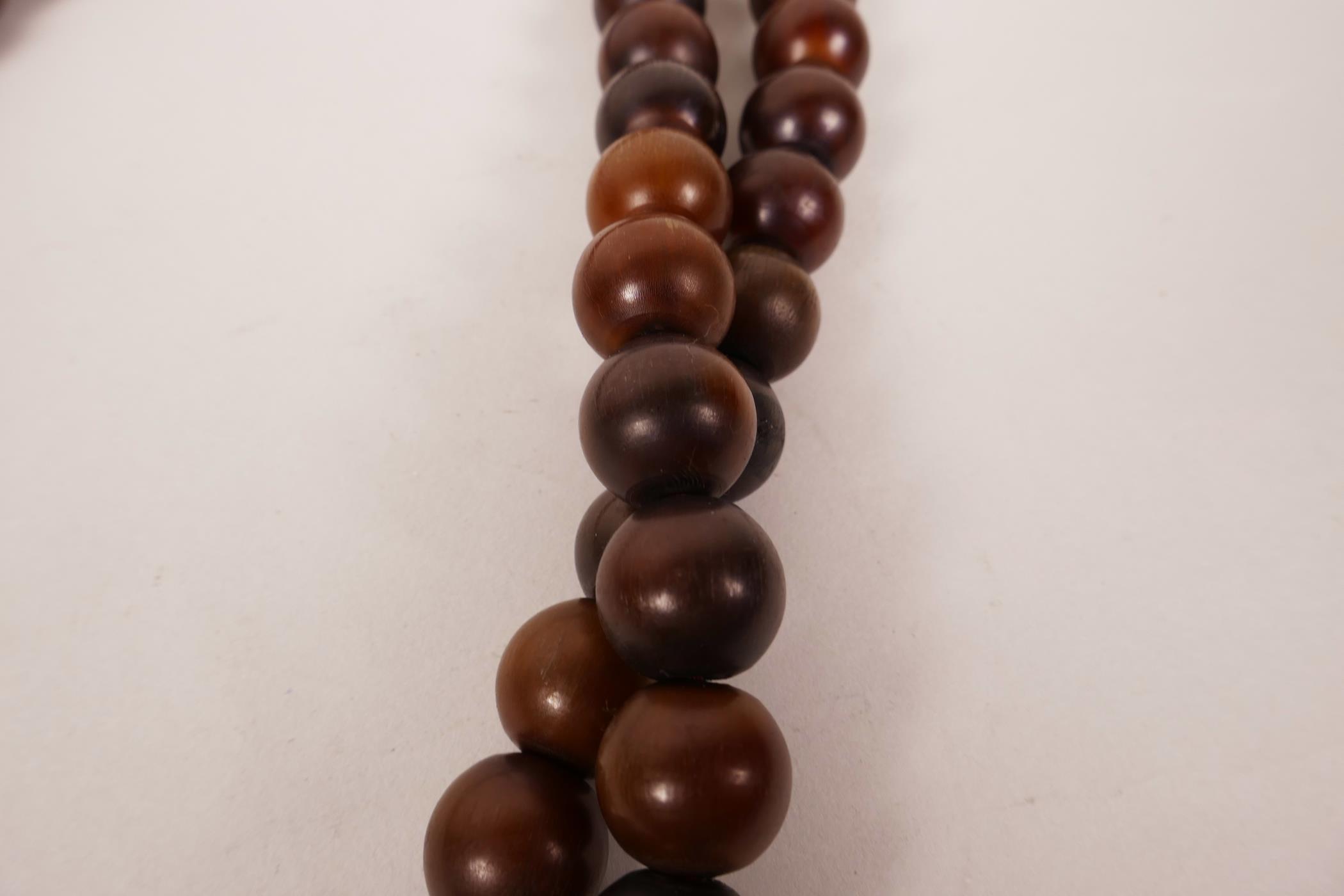 A string of horn beads, 58" long - Image 3 of 3