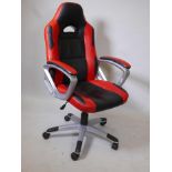 A leatherette upholstered office/gaming tilt and swivel armchair