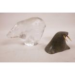 A Pukeberg Swedish glass polar bear, and an original Inuit soapstone sculpture of a walrus head,