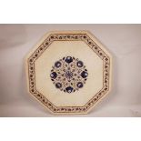 An octagonal Indian inlaid pietra dura marble table top, 21" x 21"
