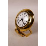 A Cartier 'Colisee' gold plated desk clock with a quartz movement, no.0568917, 3" diameter