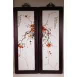 A pair of Chinese polychrome porcelain panels depicting insects on red leafed branches, in