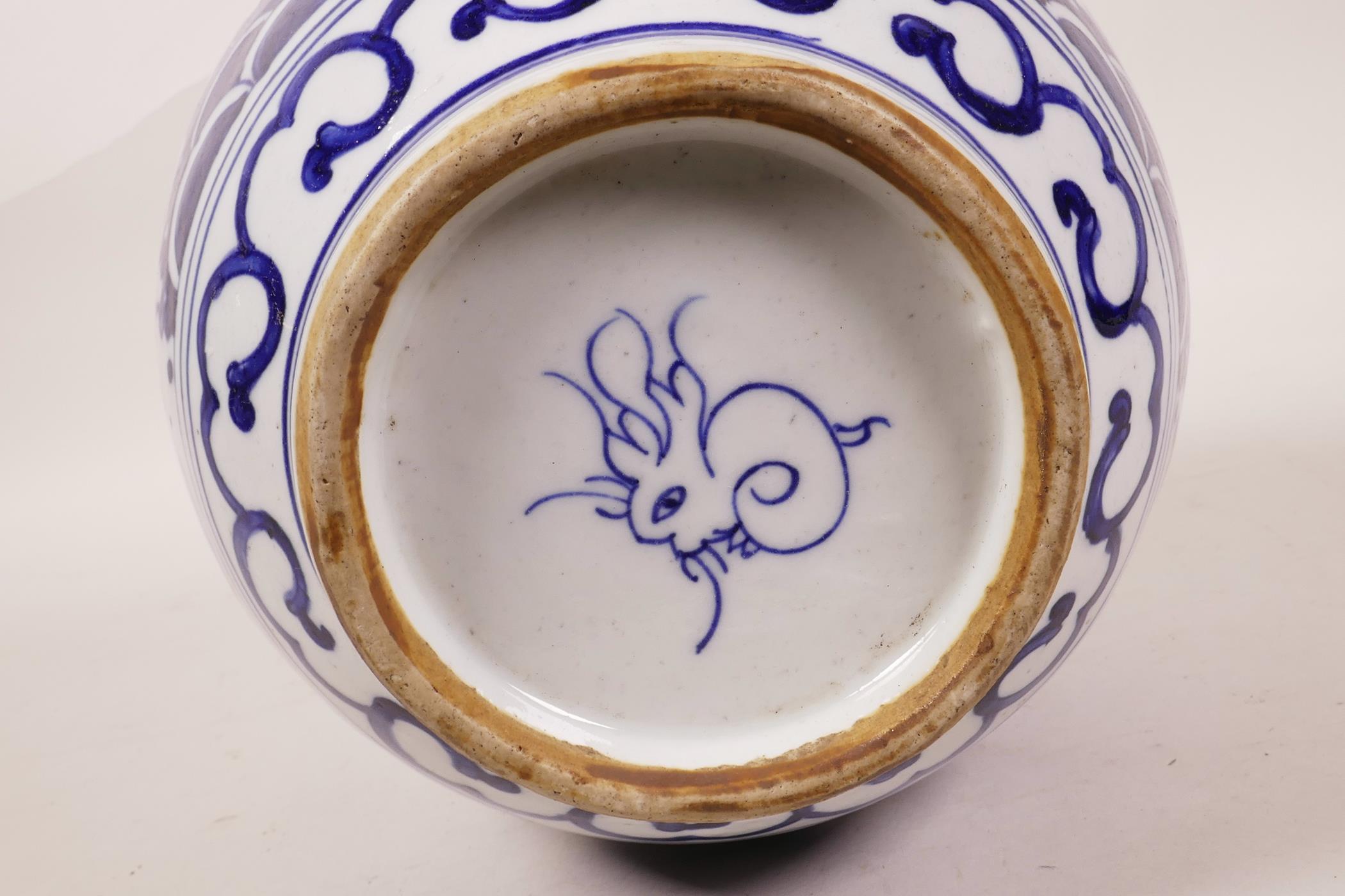 A Chinese blue and white porcelain ginger jar decorated with cranes in flight and auspicious - Image 5 of 5