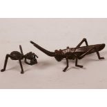 A Japanese bronze figurine of a locust, 4½" long and a smaller bronze figurine of an ant, 2" long