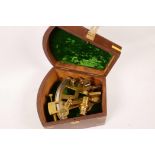 A miniature brass sextant, 5" long, in a fitted hardwood box