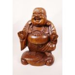 A carved wood figure of Buddha, 12½" high