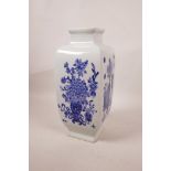 A Chinese blue and white square form vase, each side decorated with flowers, seal mark to base, 10½"