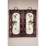 A pair of Chinese polychrome porcelain panels decorated with insects and fruiting gourd vines,