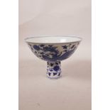 A Chinese blue and white porcelain stem bowl decorated with phoenix amongst lotus flowers, 6