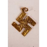 A 9ct gold swastika pendant, 2.9 grams