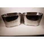 A pair of large chromium plated oval Bollinger champagne buckets engraved with quotes from Lily